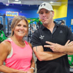 Personal trainer and woman client taking a success pic.