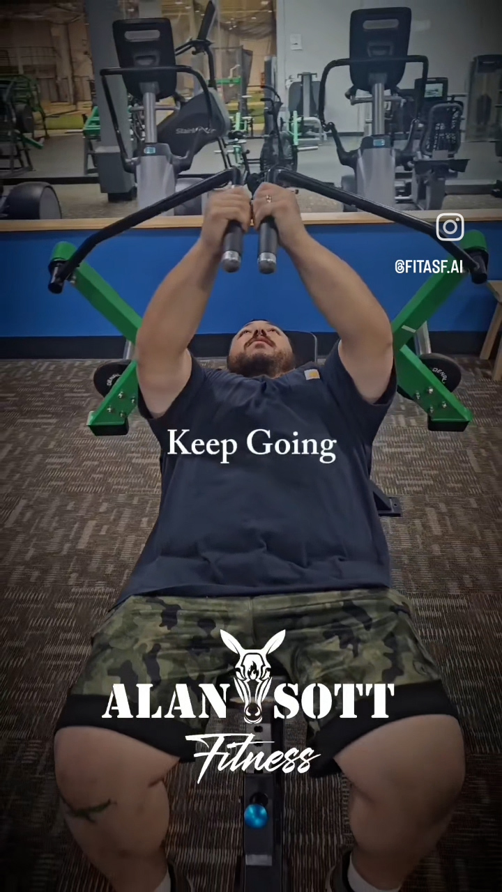 Man in his 30s weight training with his personal trainer to lose weight and gain strength.