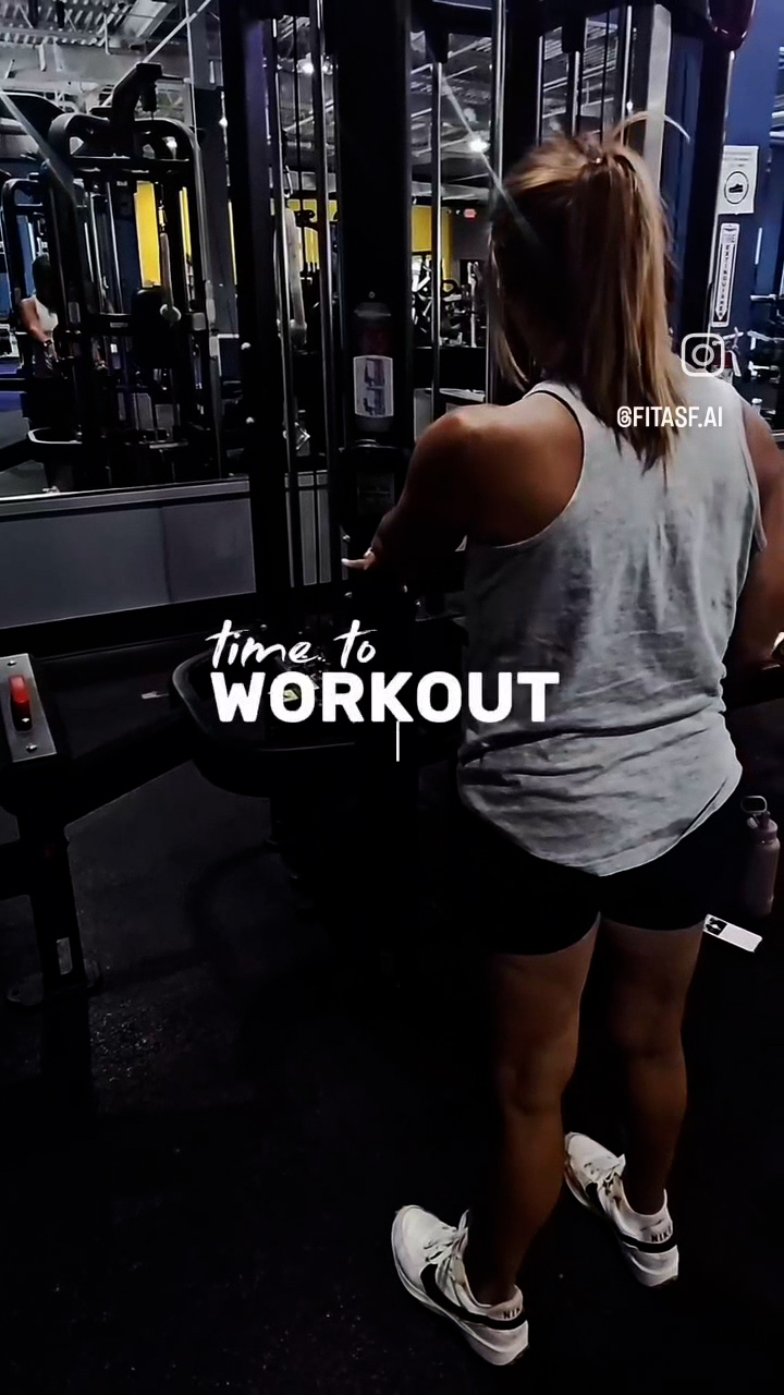 Woman, over 50, weight training with her personal trainer.